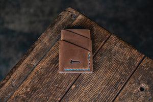 Port Wallet, Horween Chromexcel Natural hand stitched with turquoise blue thread