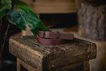 This Trade Belt is hand cut, struck through drum dyed, and is edge burnished to perfection. The solid brass buckle is easily removed and swapped with two solid brass screw posts using a standard screw driver.