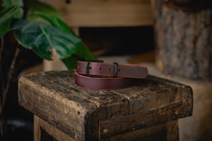 
            
                Load image into Gallery viewer, This Trade Belt is hand cut, struck through drum dyed, and is edge burnished to perfection. The solid brass buckle is easily removed and swapped with two solid brass screw posts using a standard screw driver.
            
        