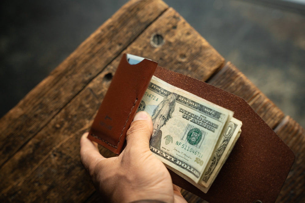 Handmade minimal leather Rollout Wallet has a single pocket for cards, and nicely rolls your cash and secures with a snap