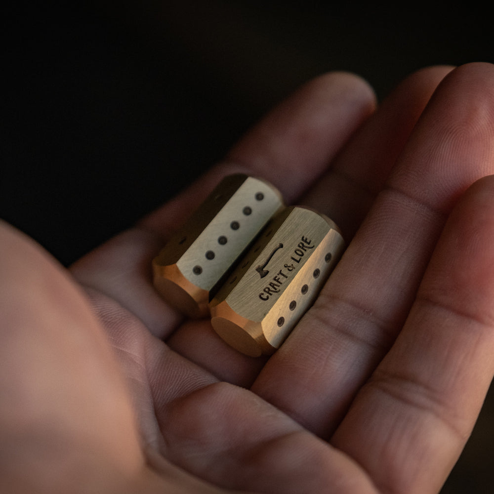 Solid brass bones dice handmade patina quality durable everyday carry games gaming