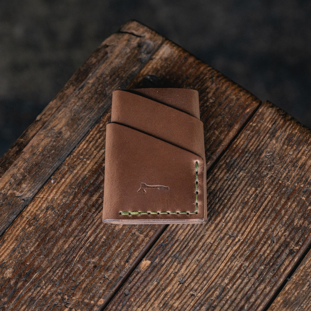 
                  
                    Port Wallet, Horween Chromexcel Natural hand stitched with olive green thread
                  
                