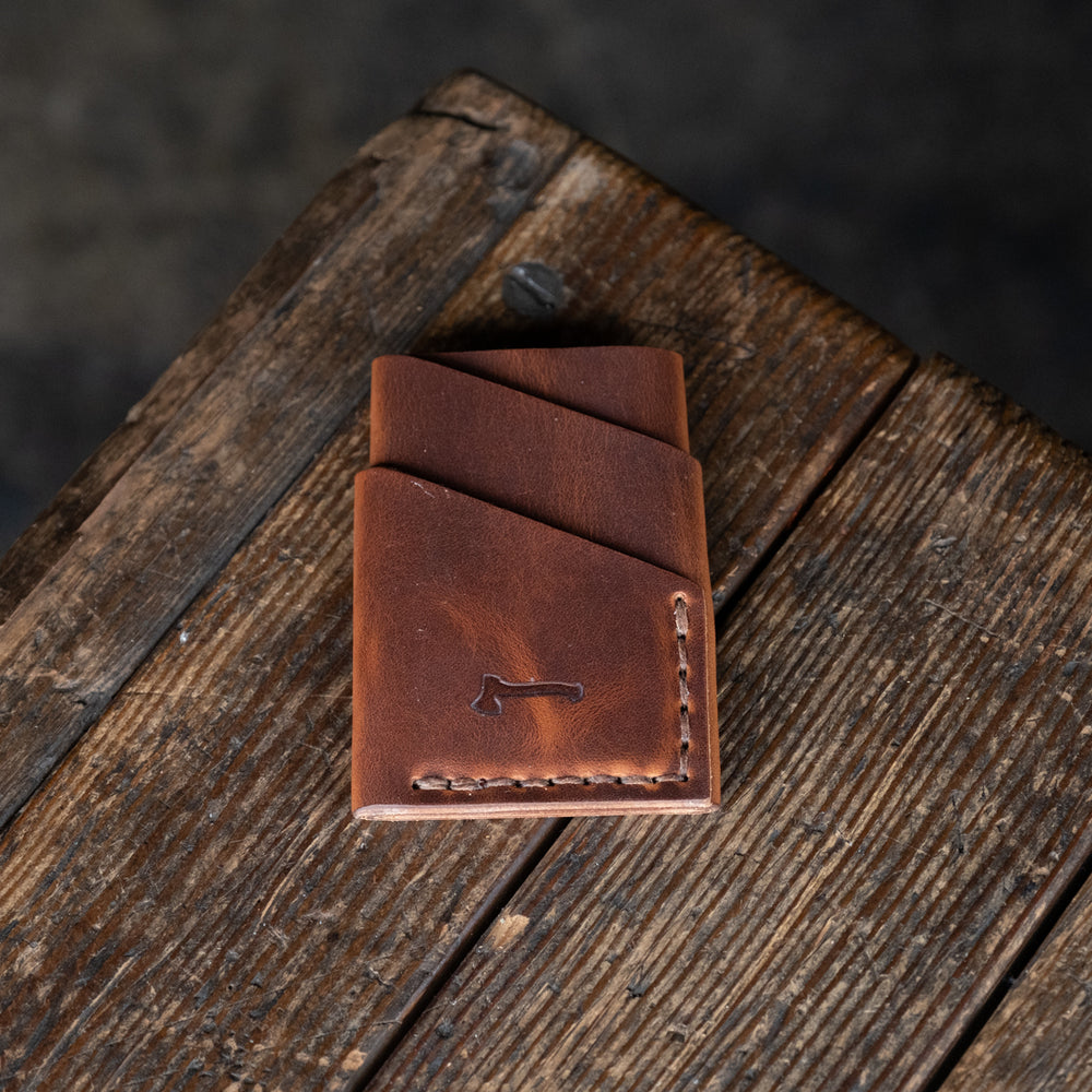 
                  
                    Port Wallet Craft and Lore, Horween Dublin English Tan and hand stitched with brown thread
                  
                